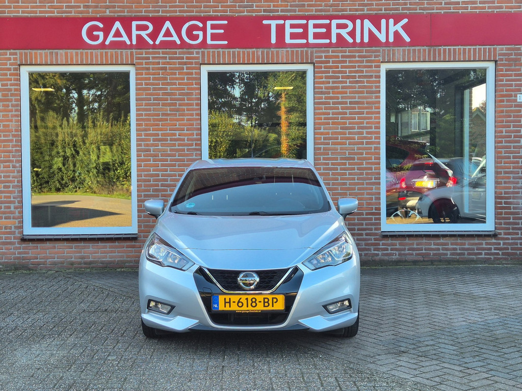 Nissan Micra 1.0 IG-T Tekna voor de gevel van Garage Teerink